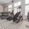 a room with treadmills and windows